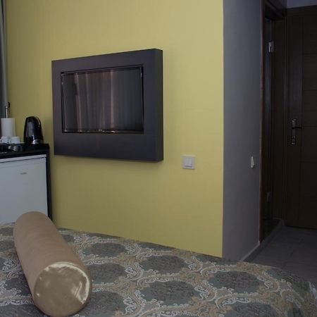 Itimat Otel Урла Екстериор снимка