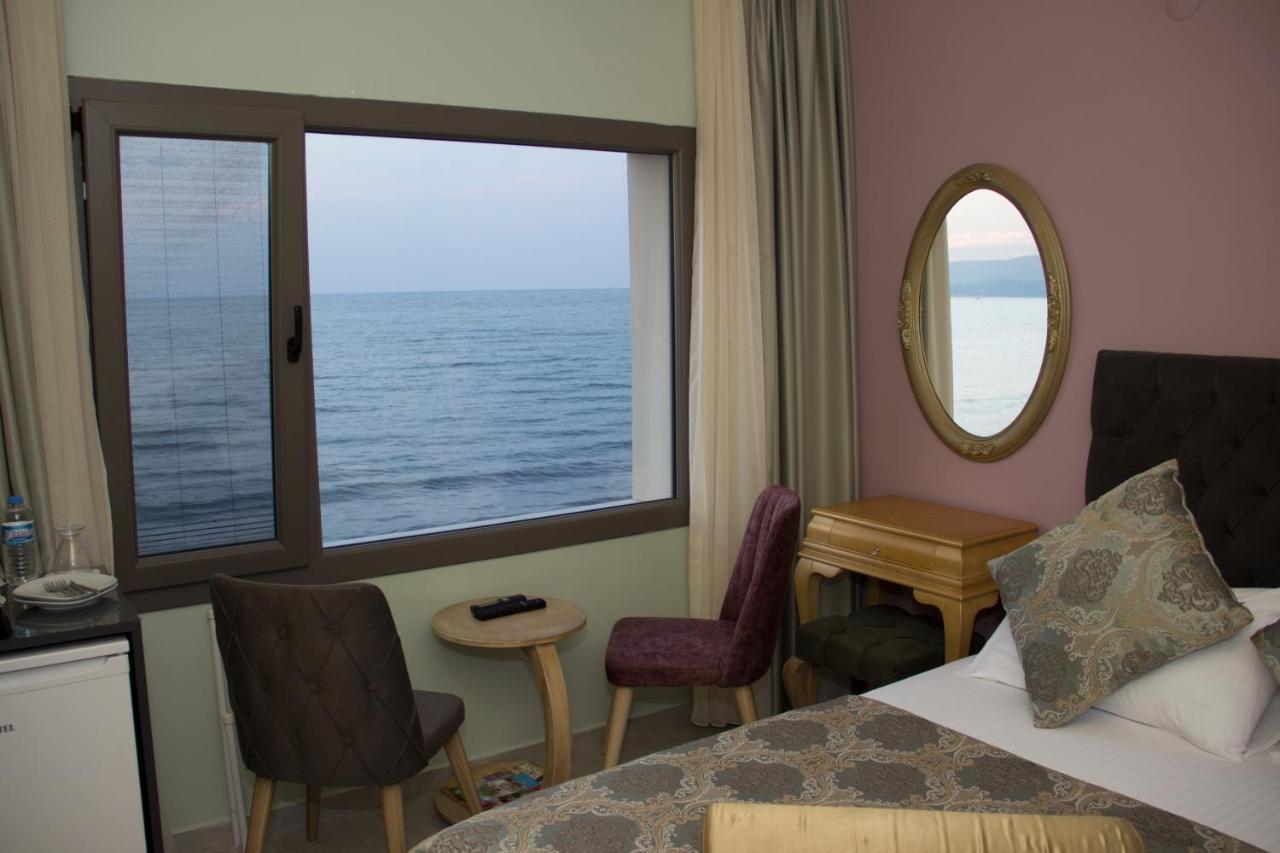 Itimat Otel Урла Екстериор снимка