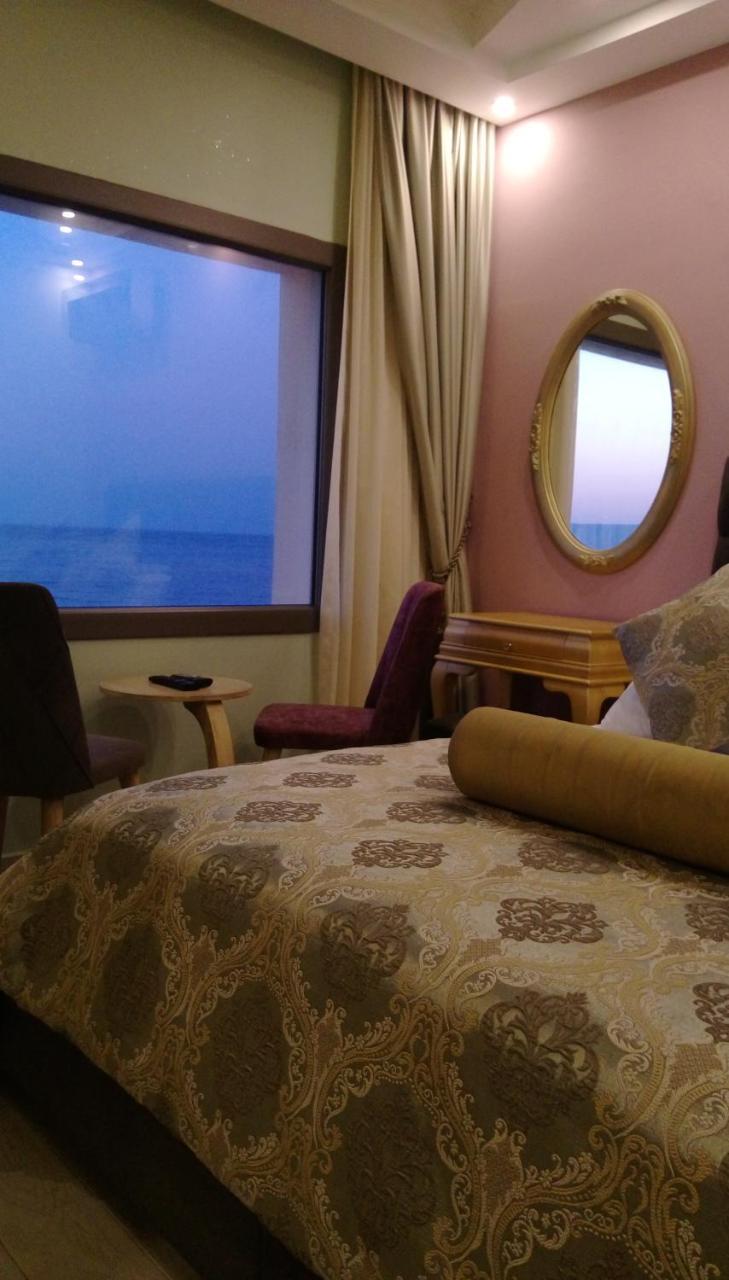 Itimat Otel Урла Екстериор снимка