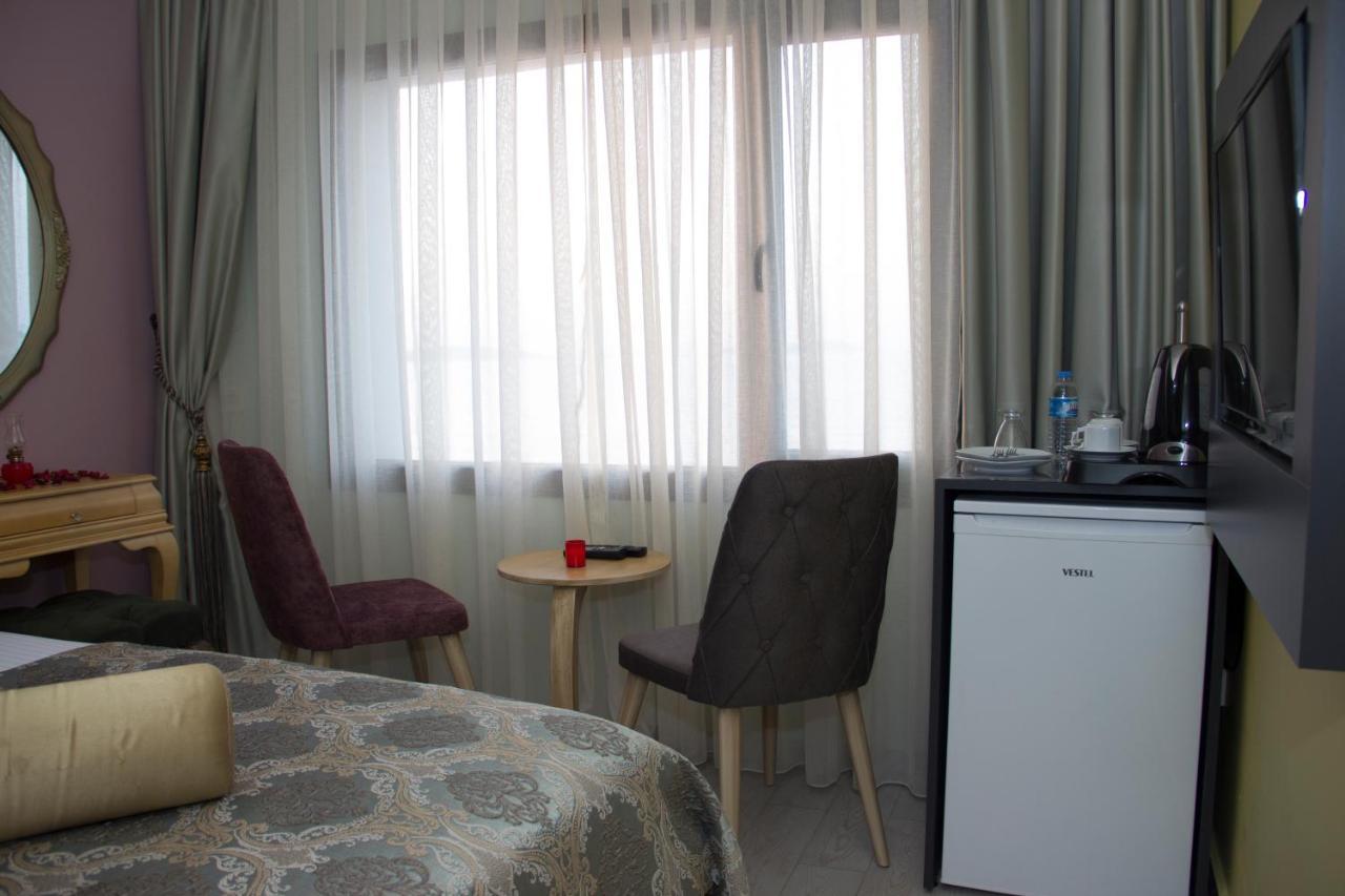 Itimat Otel Урла Екстериор снимка