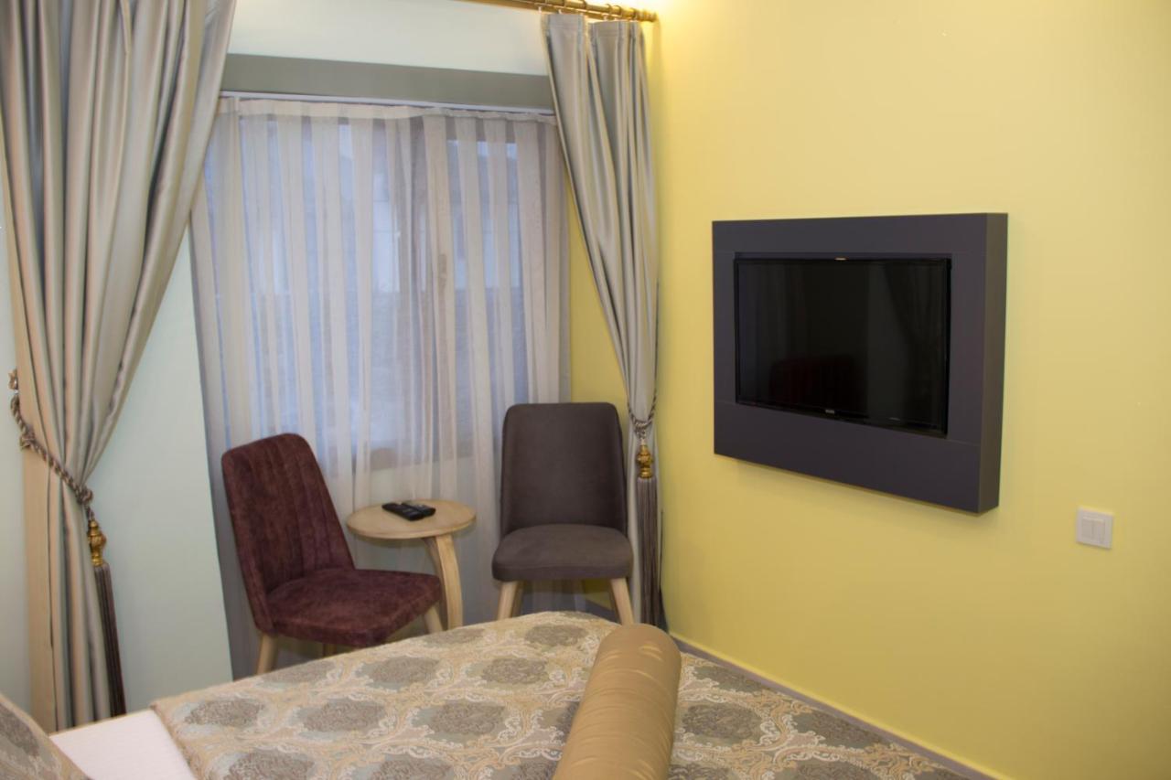 Itimat Otel Урла Екстериор снимка