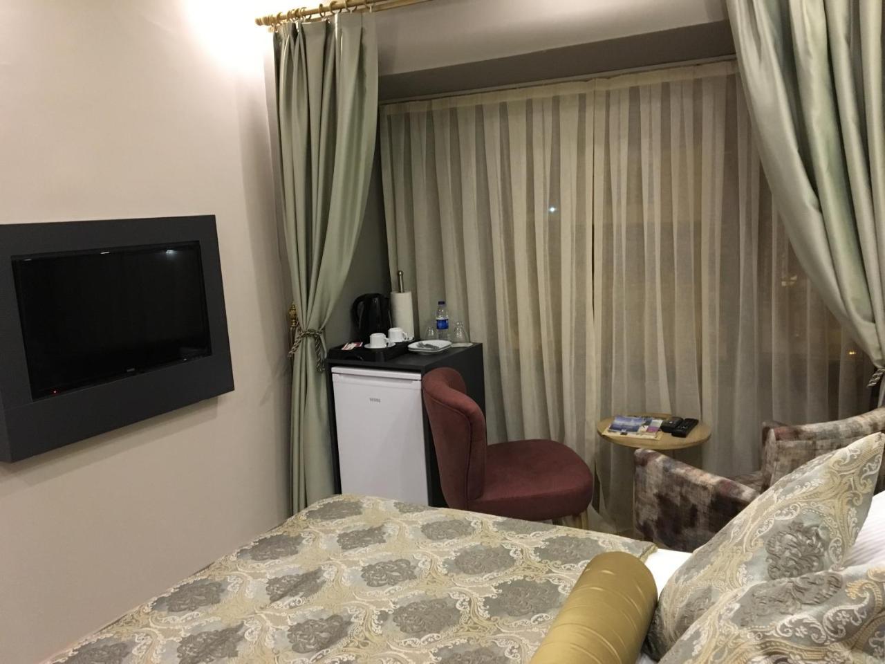 Itimat Otel Урла Екстериор снимка