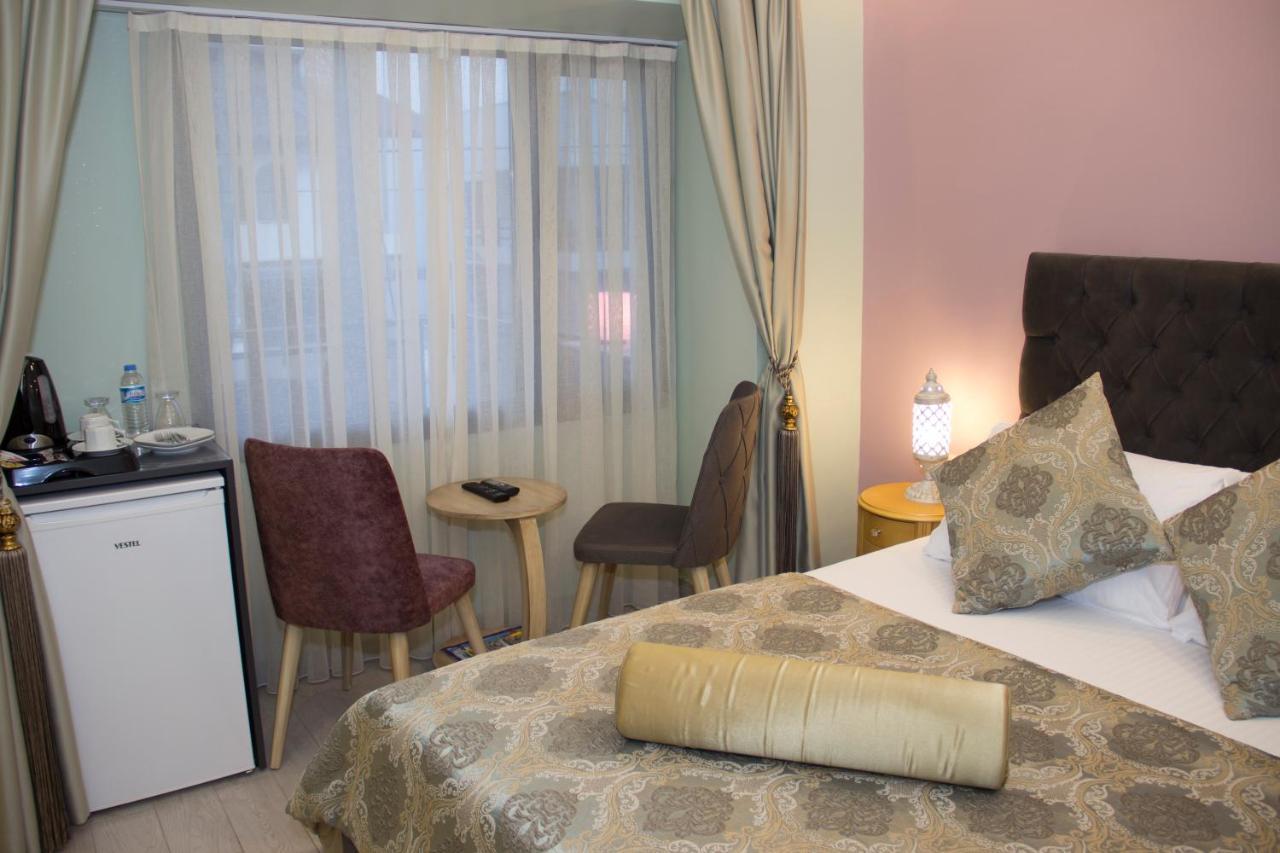 Itimat Otel Урла Екстериор снимка